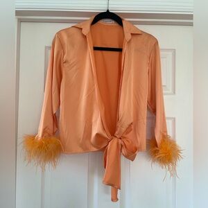 Rumored orange tie top